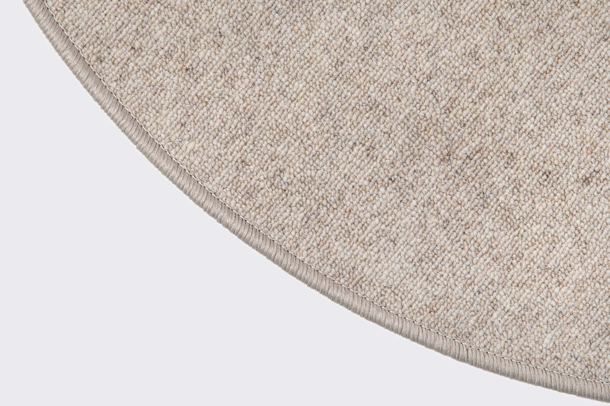 Rundt tæppe med kantning