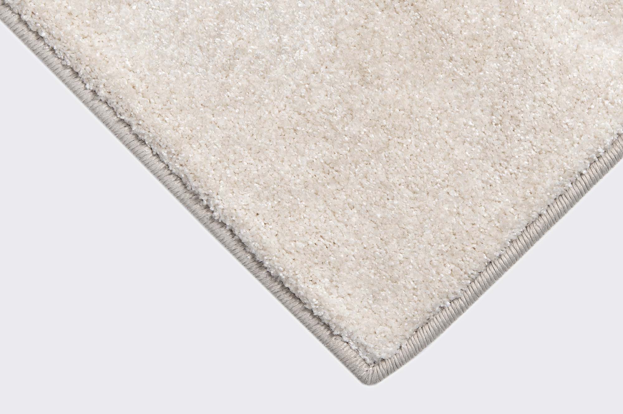 Vi kantsyer altid vores tæpper med lige hjørner