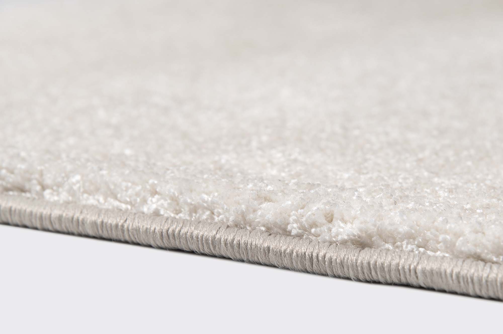 Tykkere tæppe (18mm) med kantning